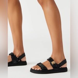 Steve Madden Big Mona Black Sandals with Gold Accents